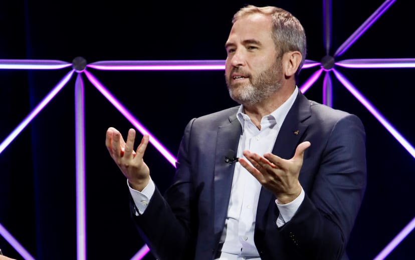 Ripple CEO Garlinghouse slams SEC, whales spend on NFT art