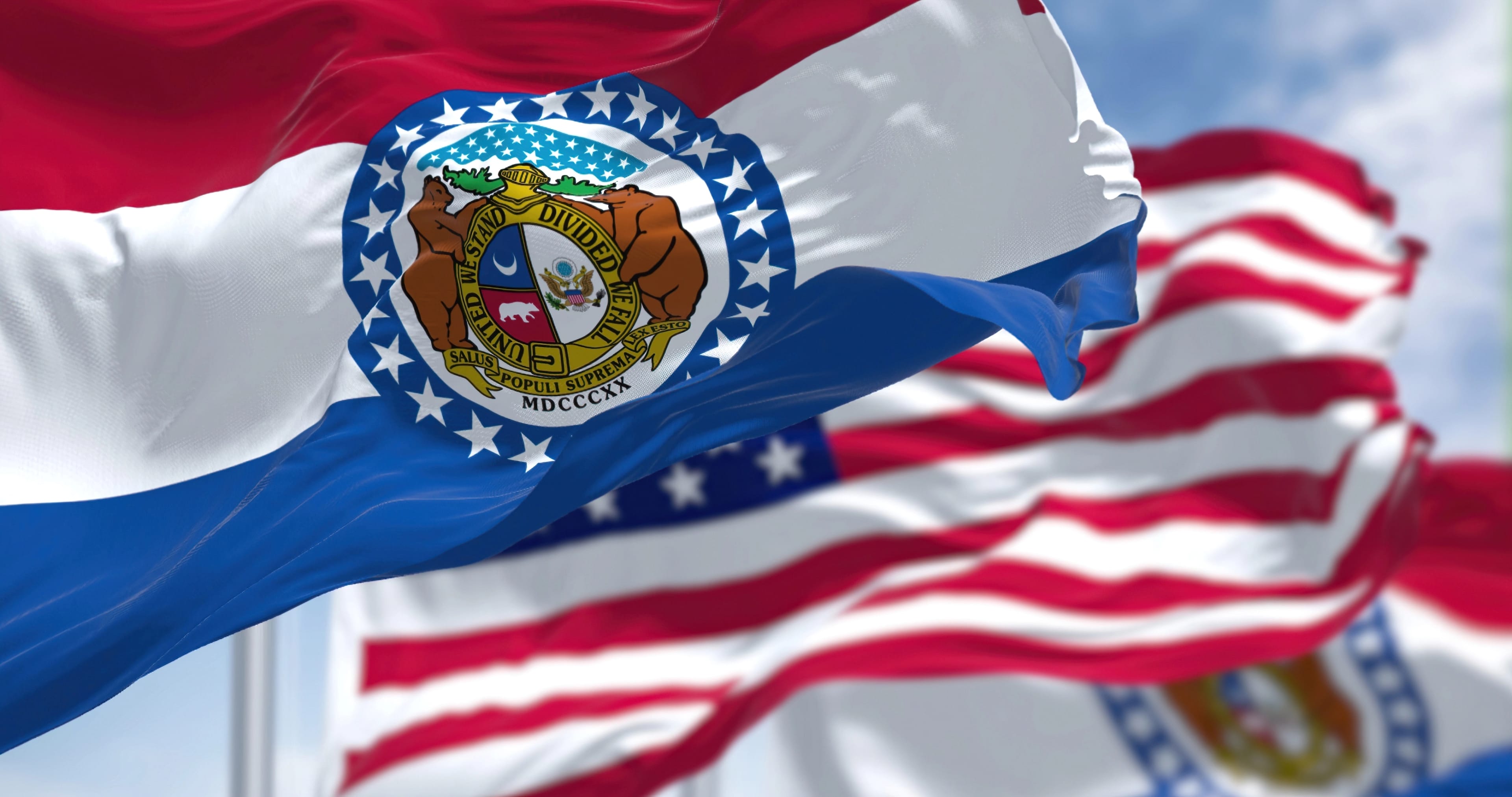 The,Missouri,State,Flag,Waving,Along,With,The,National,Flag